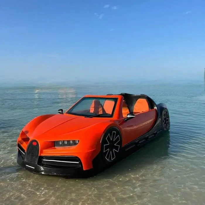 An orange jet car floating on calm shallow water
