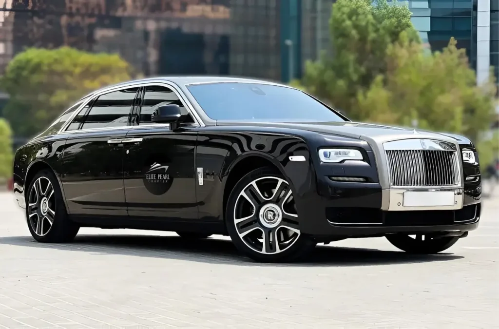 Black rolls royce of with logo of elite pearl charter